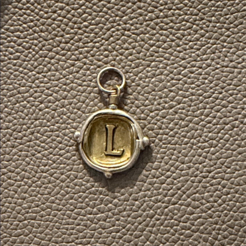 New Waxing Poetic initial L